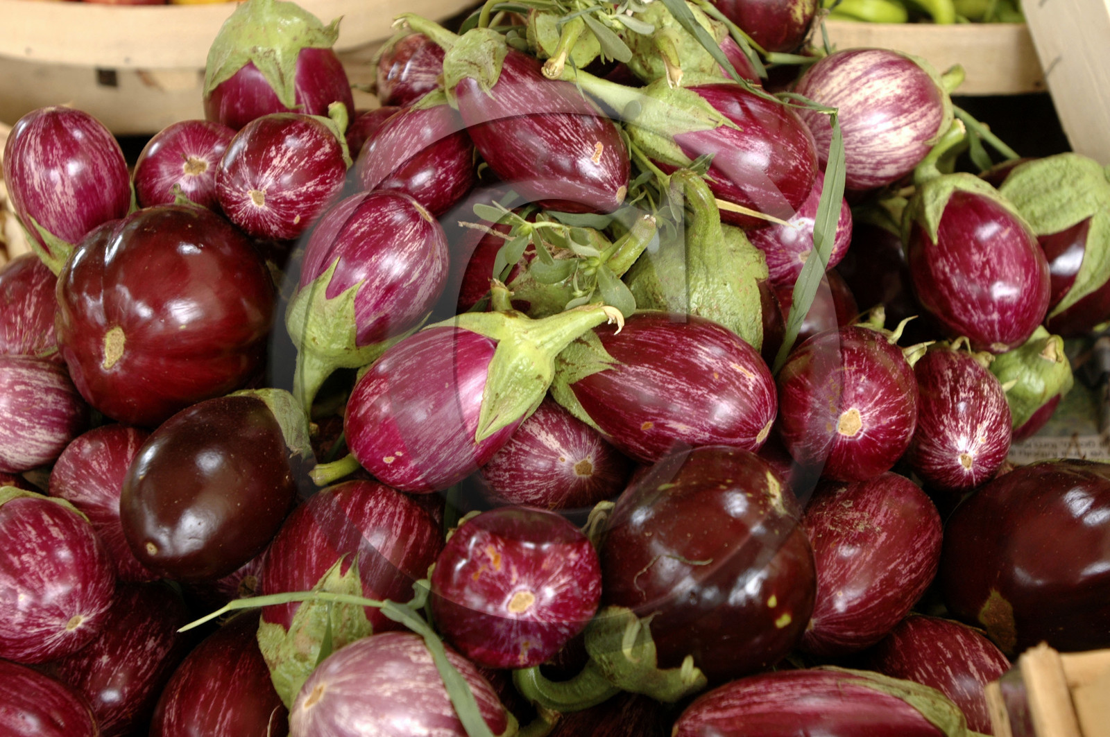 Aubergines on a market stall